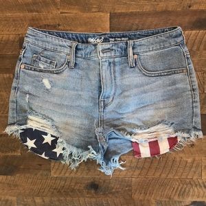 American Flag distressed jean shorts.